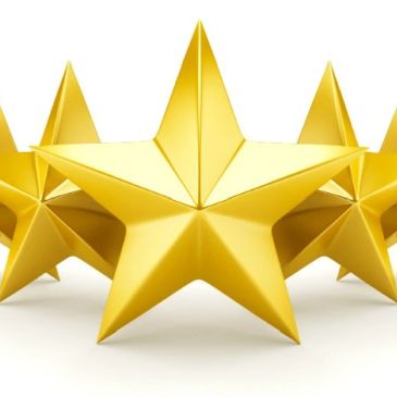 Three shiny gold stars against a white background.