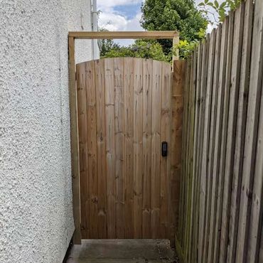 Bespoke side gate with code lock.