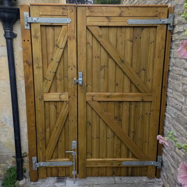 Double gate with secure code lock.