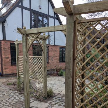 Zig-zag trellis installation on patio.