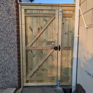 Double gate for side access to house.