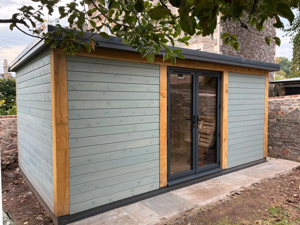 Custom garden office building with oak frame.