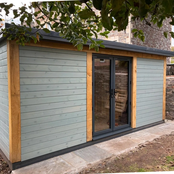 Completed custom garden office with oak frame.