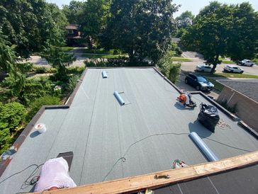 Professional install of a modern residential Flat Roof Mod-Bit membrane system. Durable & watertight