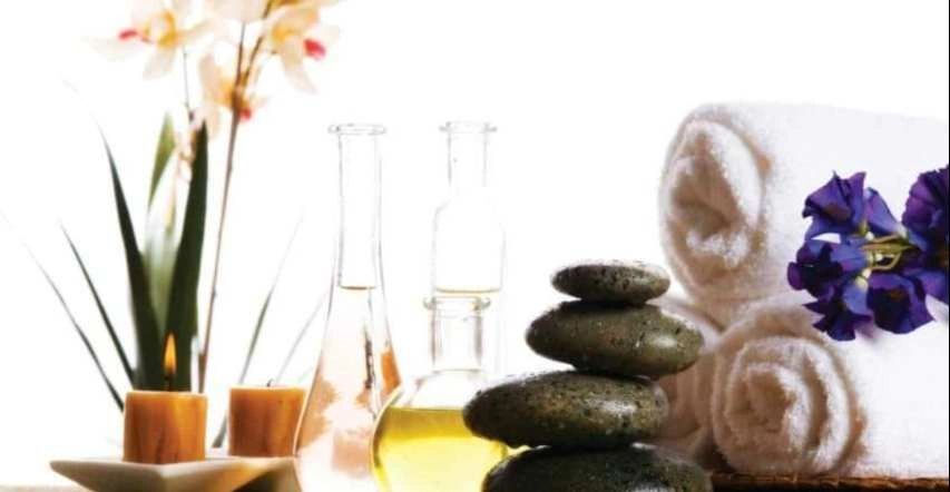 Spa-like. Flowers, candles, rocks, and towels