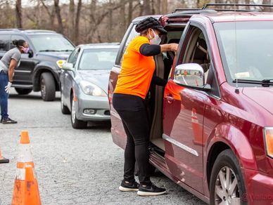 Woman checking a car