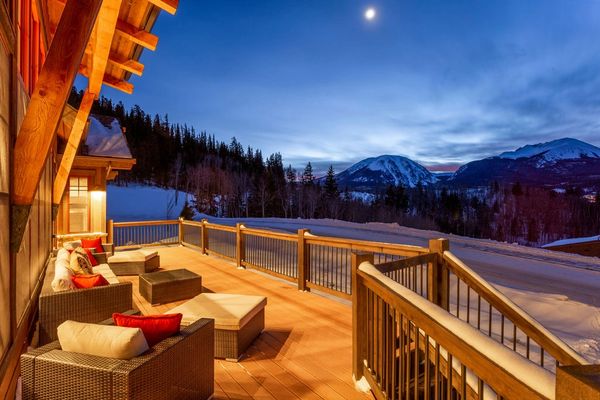 Custom mountain home designed by a colorado architect in summit county. View this custom deck.