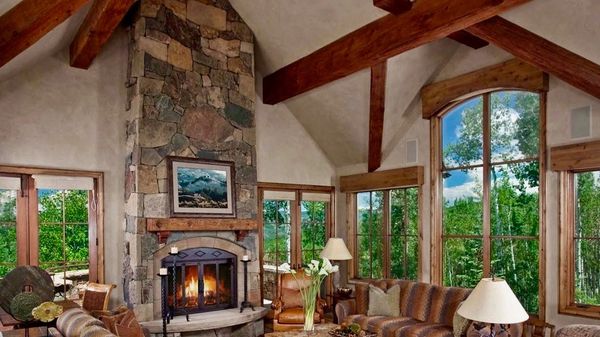 A custom mountain home designed by a colorado architect. Kickback in this spacious cozy living room.