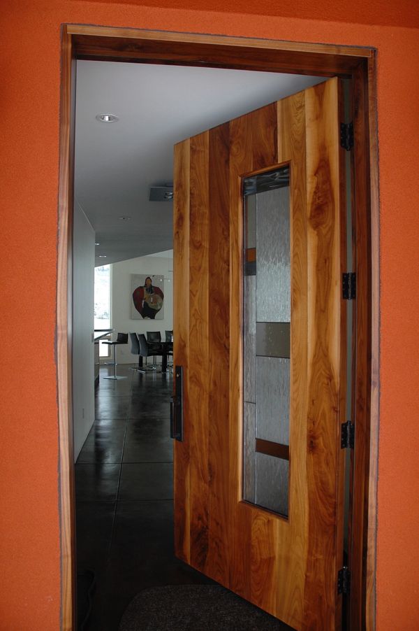 This is a contemporary mountain home designed by an architect in colorado. Check out the custom door