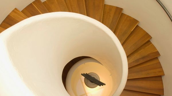 A spiral staircse makes this a custom home. Inspired by nature, designed by an architect in aspen.