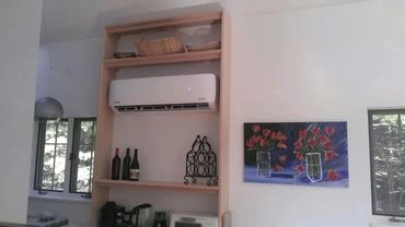 Daikin indoor heat pump unit installed in Maine home interior by Bangor HVAC