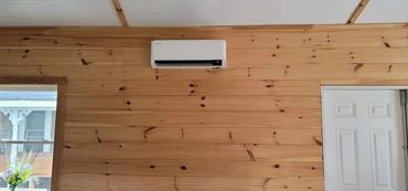 Indoor wall-mounted heat pump unit installed in Maine home by Bangor HVAC