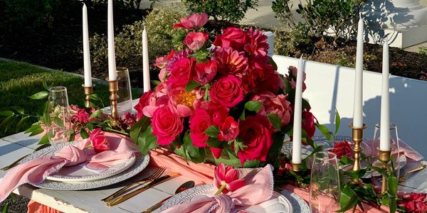 Sweetheart Table decorated with Wedding Flowers and candles. 