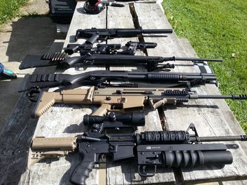 lots of guns, shotgun, rifles, pistols, scopes, sights, hand grips, scar, remington, ar-15 ar15 