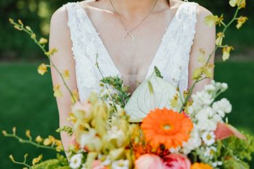 Bright floral wedding bouquet. Photo by The Wickerts Photography
