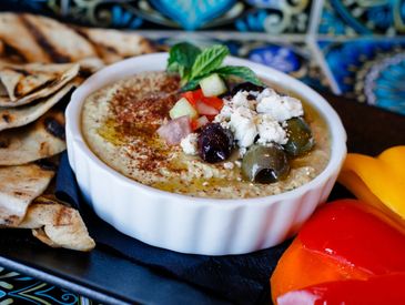 Green Chili Hummus appetizer
vegetarian 
zesty hummus | housemade flatbread |  fresh veggies
