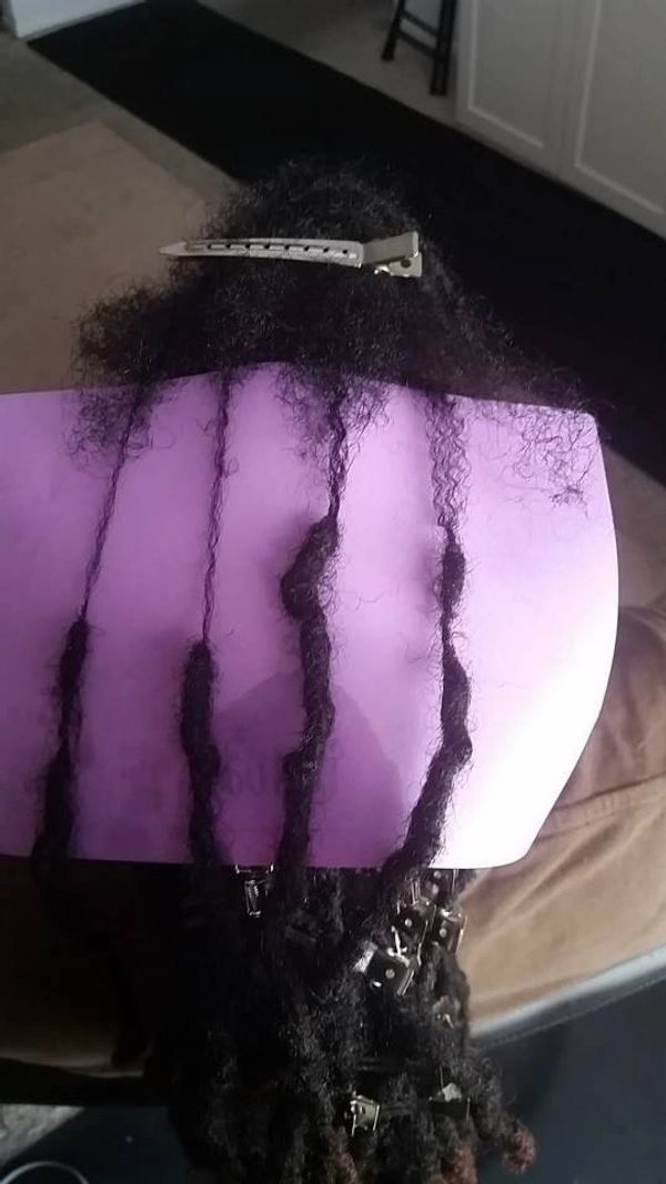 Here we have a few locs that are experiencing thinning. All we need to schedule is a LOC REPAIR serv