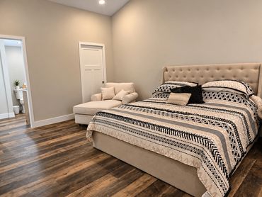 Spacious bedroom in the Modern Camping Suite at Patt's Place, LLC in Bonne Terre, Missouri, featurin