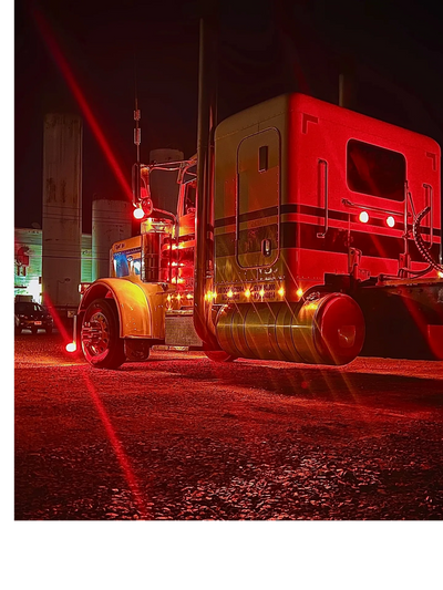 Sandell Transport truck number 014 at night