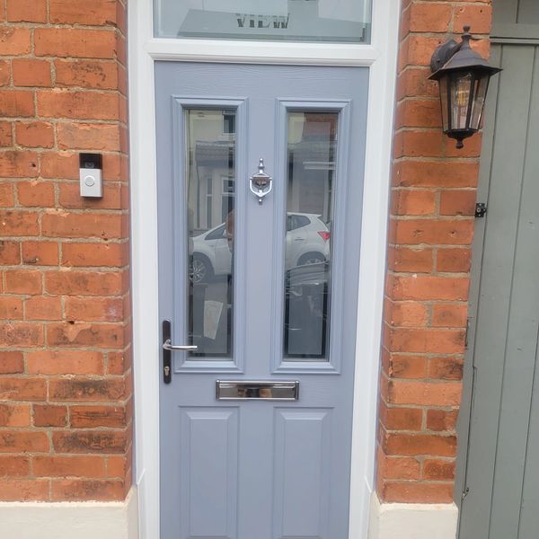 Wooden door with two frames and windows