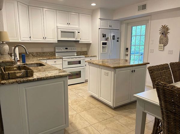 Kitchen cabinets painted by Myers Cape Coral Painting.