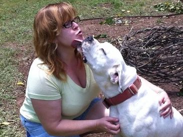 Karen and our neighbors dog! he comes every day for some loving!