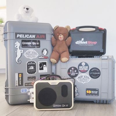 Ghost hunting kit with BooBuddy Jr., Spirit Box, and EMF detectors in a Pelican case