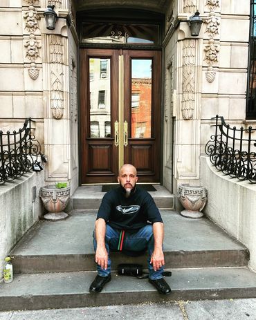 Infinite outside of the Notorious B.I.G childhood home on ST. James PL in Brooklyn, NY.