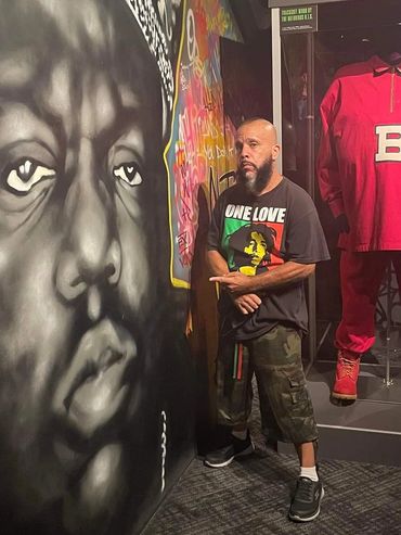 Infinite next to a Notorious B.I.G exhibit in NYC.