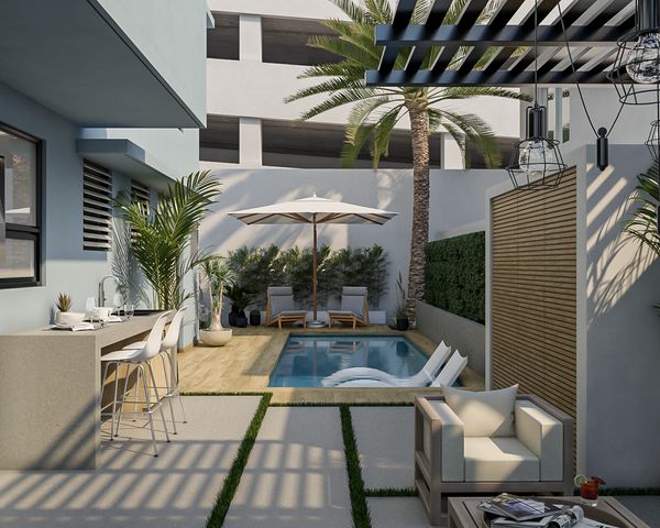Backyard retreat with a pool, laundry, putting, and al fresco sitting area in Condado Puerto Rico.