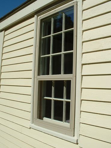 Fully restored historical window with the invisible Allied Storm Window installed.