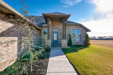 View of sidewalk leading to the front door of a new home in Seiling, OK. MLS ready for listing