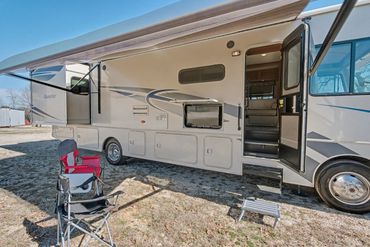 Professional photo of the outdoor television viewing area of an RV for sale in North Texas
