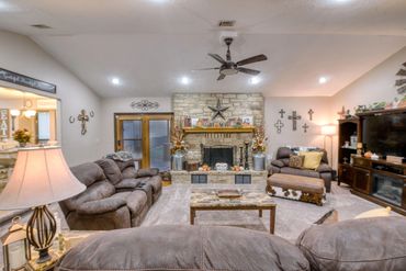 Professional photograph of the living room of a home listed for sale in Elk City, OK