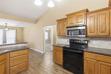 Kitchen with wood cabinets, home for sale, Elk City, OK