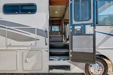 Professional photo of the entrance to an recreational vehicle listed for sale in North Texas