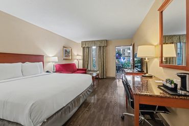 Guest room with king bed at Northwest Inn hotel, Woodward, OK