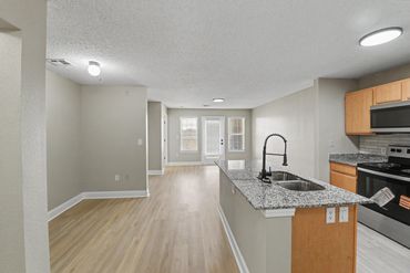 Apartment living space at Chisholm Trail Crossing in Vernon, Texas
