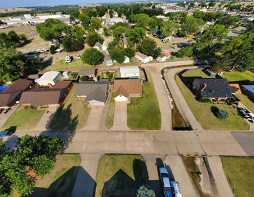 Wide aerial view of 111 Mockingbird Lane in Elk City, Oklahoma