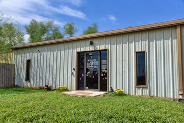 View of the front of a small business in Elk City, OK.