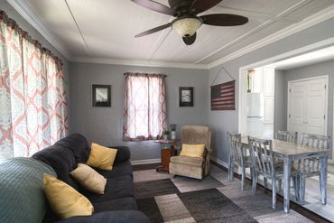 Photograph of living room and dining area of a home in Waynoka, OK, listed on Airbnb
