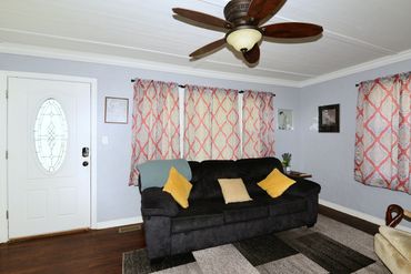 Photograph of front door and living room of a short-term rental in Waynoka, OK, listed on Airbnb