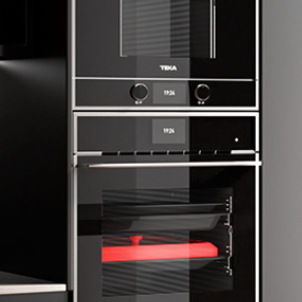 Modern built-in microwave and oven with sleek black finish in a kitchen.