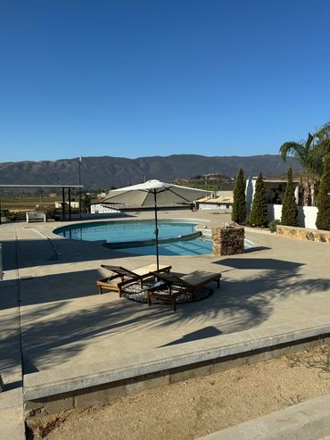 Lounge poolside at Iboga Treatment Center .