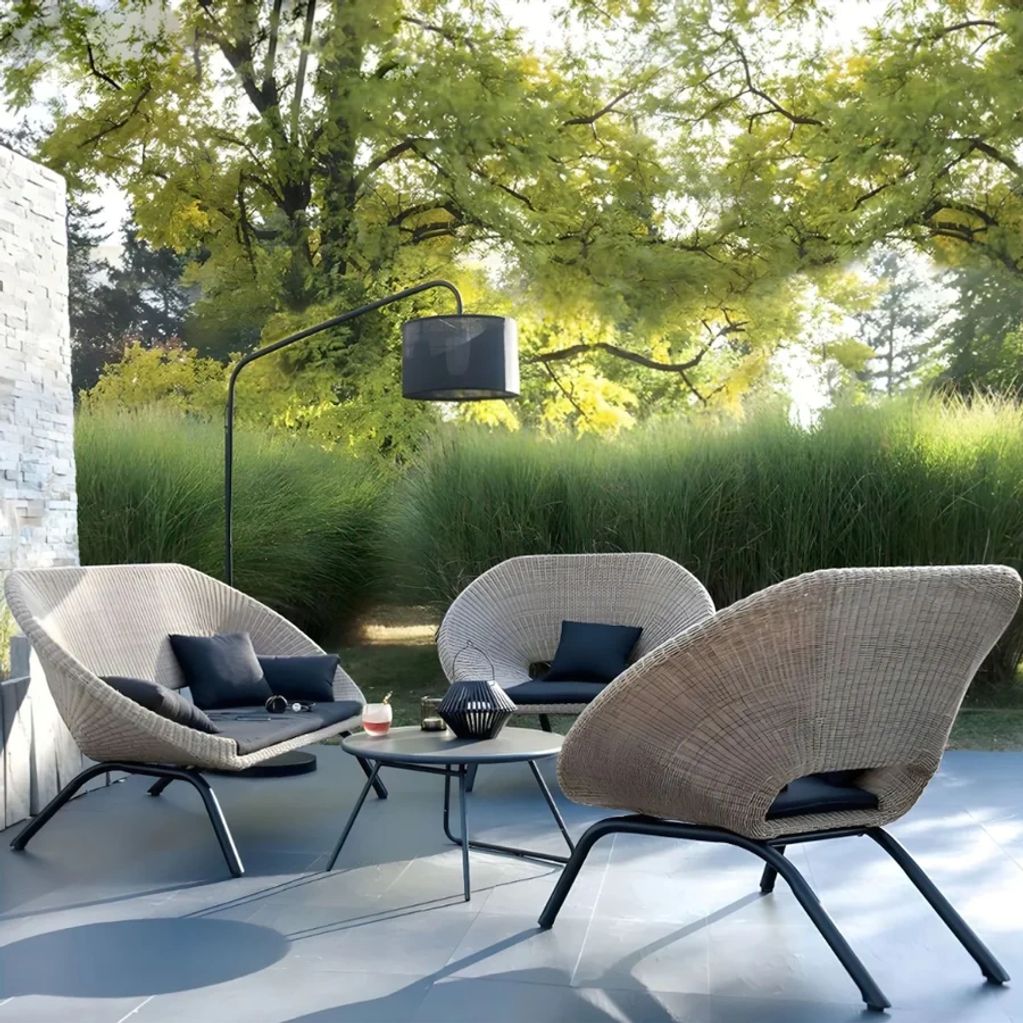 The Lilia Outdoor Set combines the timeless beauty of rattan with the strength of a metal frame, cre