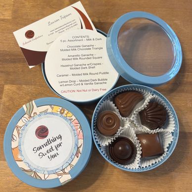 5 pc. Assortment (can be personalized) in reuseable round tin with magnet backing.