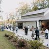 Group of people standing beside wedding venue
