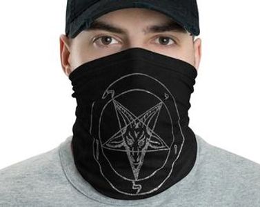 A man wearing a satanic Mask in order to buy or sell goods before the Mark of the Beast program.