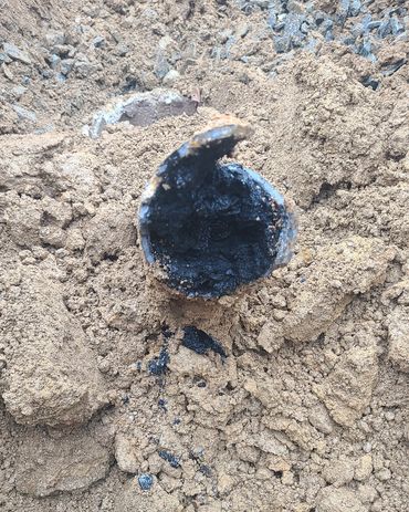 Complete rotted and clogged cast iron pipe needed replacement.