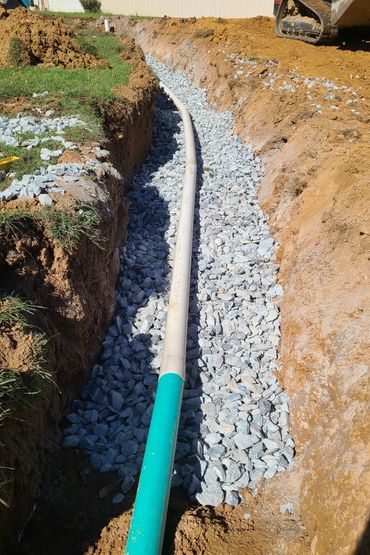 Installing new drainfields due to failed system.